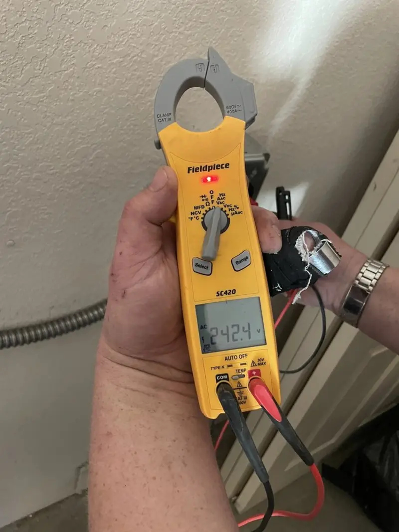 Voltage testing with clamp meter during Generator Installation in Granite Bay